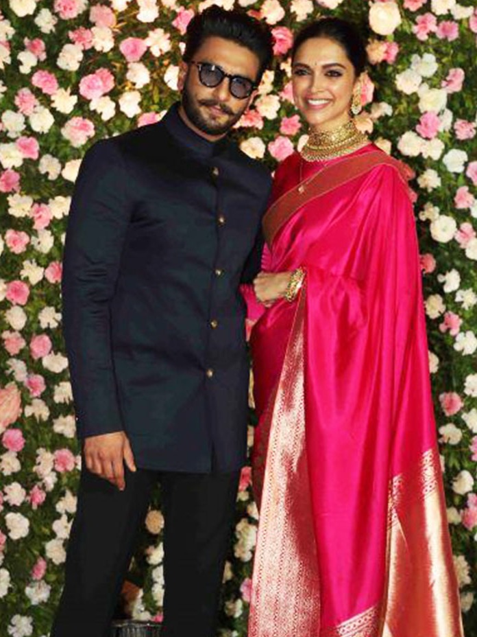 Deepika and Ranveer twinning in pink Sabyasachi outfits at
