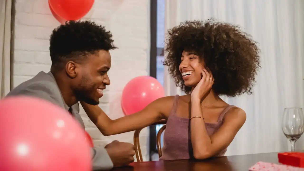 Fitness, water bottle and black couple toast outdoors together