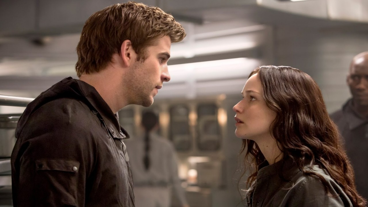 The World Of The Hunger Games  Jennifer Lawrence, Liam Hemsworth