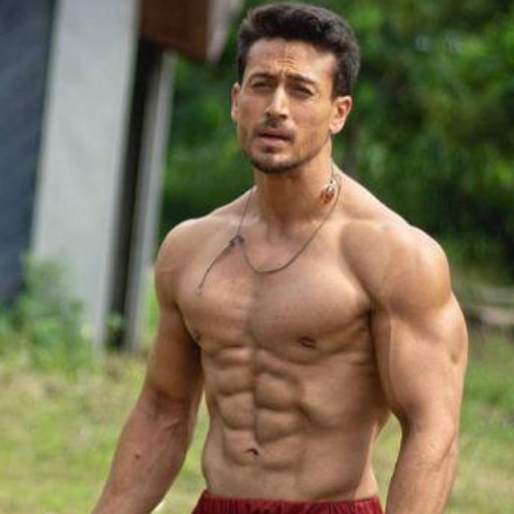 10 Best Tiger Shroff Hairstyles  Mens Hairstyles  Haircuts 2023