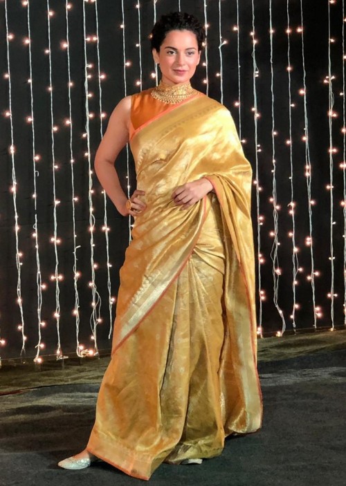 Actress Pooja Hegde New HD Stills In A Golden Saree