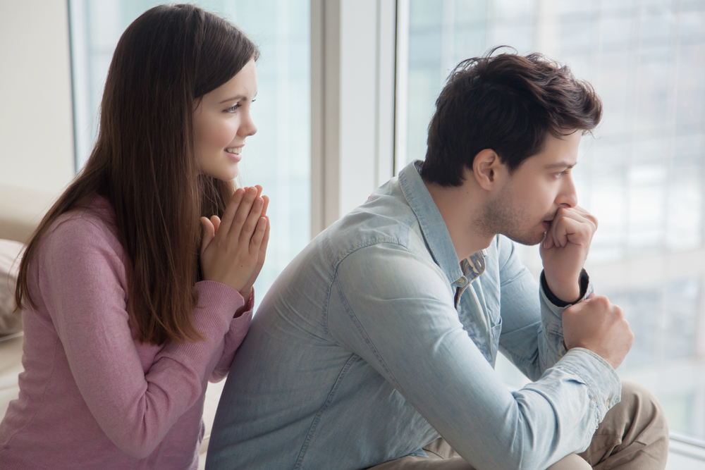 A wife seeking her husband's approval after writing an apology letter