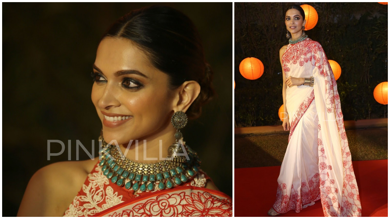 Deepika in a white and red saree