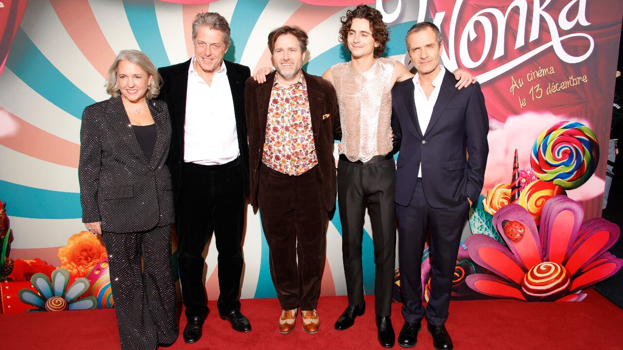 Hugh Grant, Paul King, and Timothee Chalamet (Getty Images)