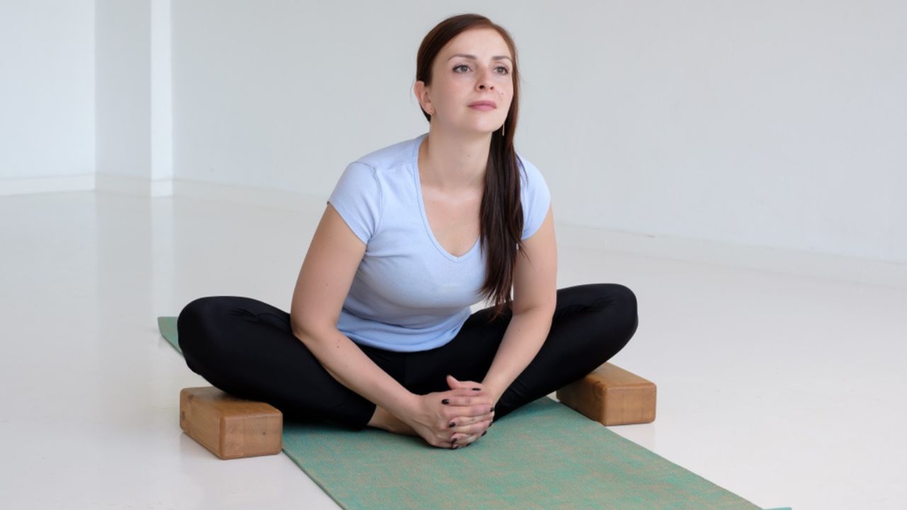 Baddha Konasana – Cobblers Pose (Series 1) | Asana – International Yoga  Journal