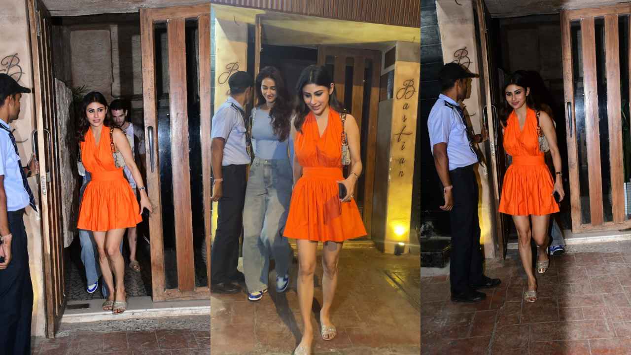 Mouni Roy’s super hot halter neck mini-dress is proof that orange indeed is the new black (PC: Viral Bhayani)