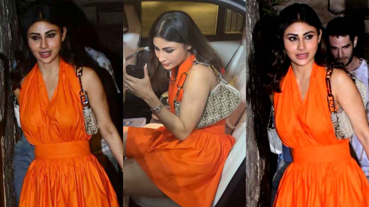 Mouni Roy’s super hot halter neck mini-dress is proof that orange indeed is the new black (PC: Viral Bhayani)