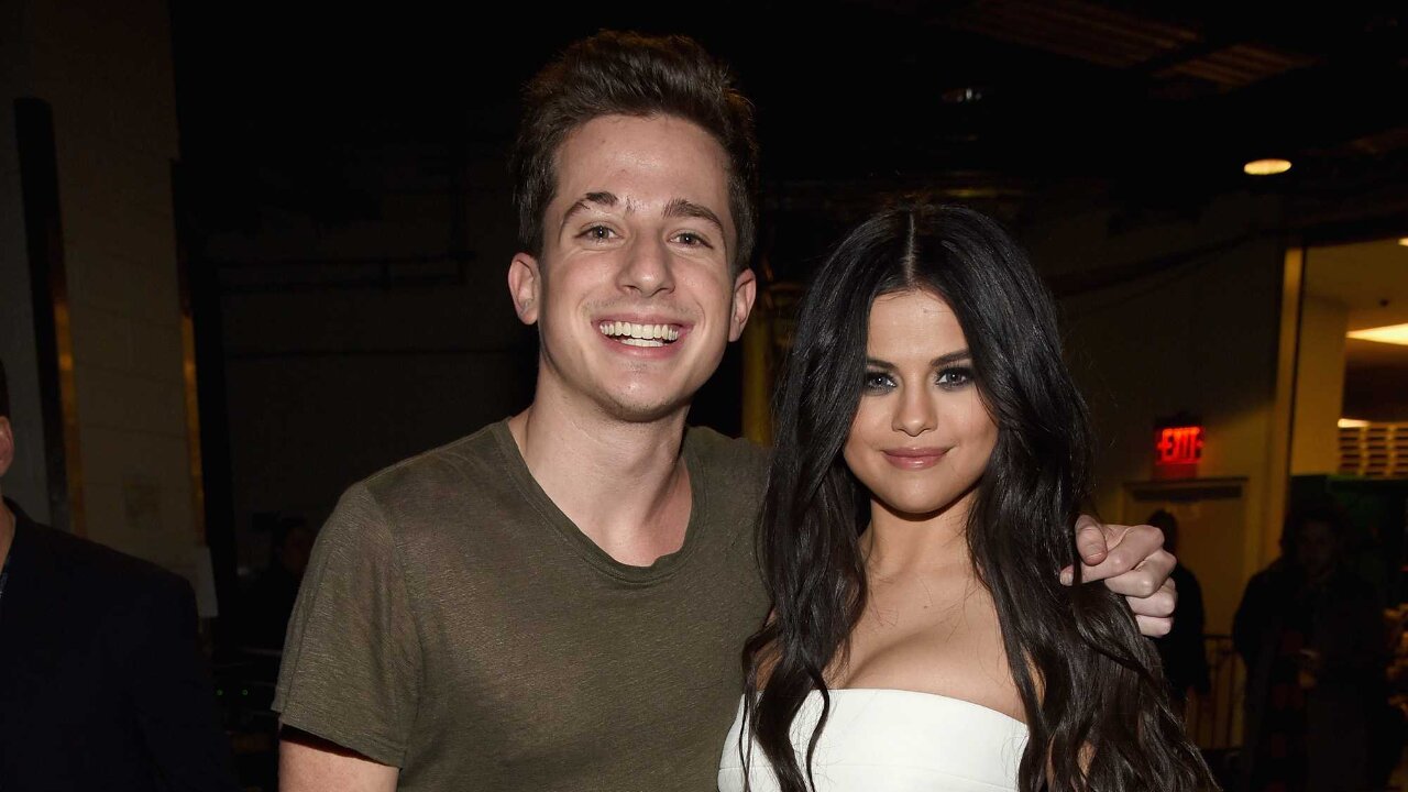 Charlie Puth and Selena Gomez via Getty Images