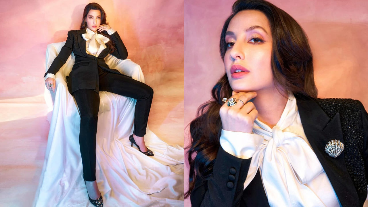 Nora Fatehi in black pants and satin shirt 