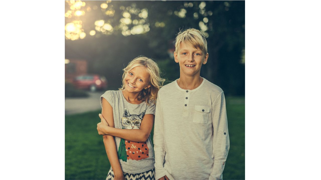 A brother sweetly kissing his sister thinking about  Cute and Adorable Nicknames for Brother