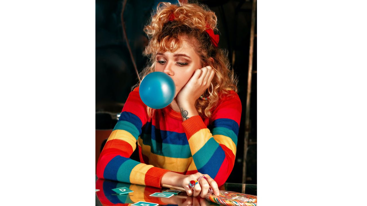 Woman in Sweater with Bubblegum