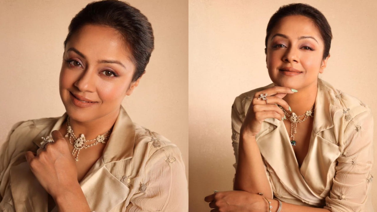 Jyothika is giving tough competition to the moon's radiance with her ivory draped dress and jacket