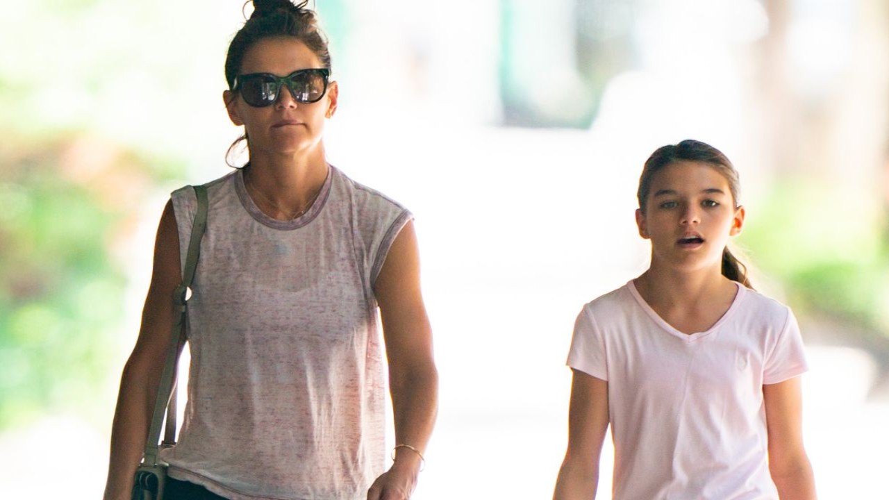 Suri Cruise with Katie Holmes via Getty Images