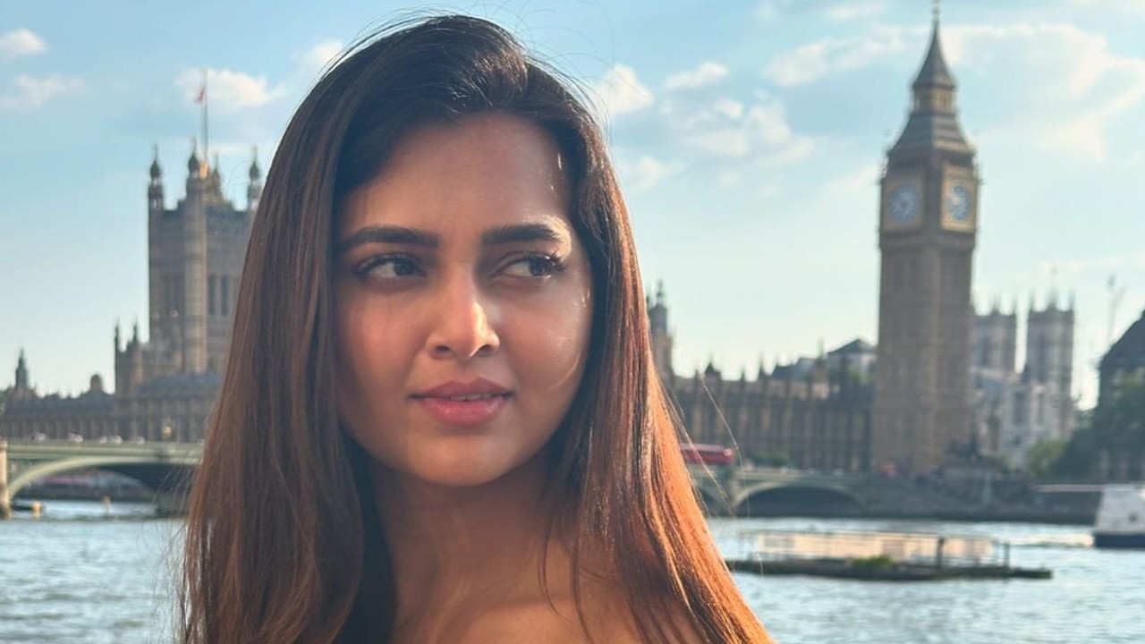 PICS: Tejasswi Prakash sets hearts aflutter in red halter dress from her London getaway