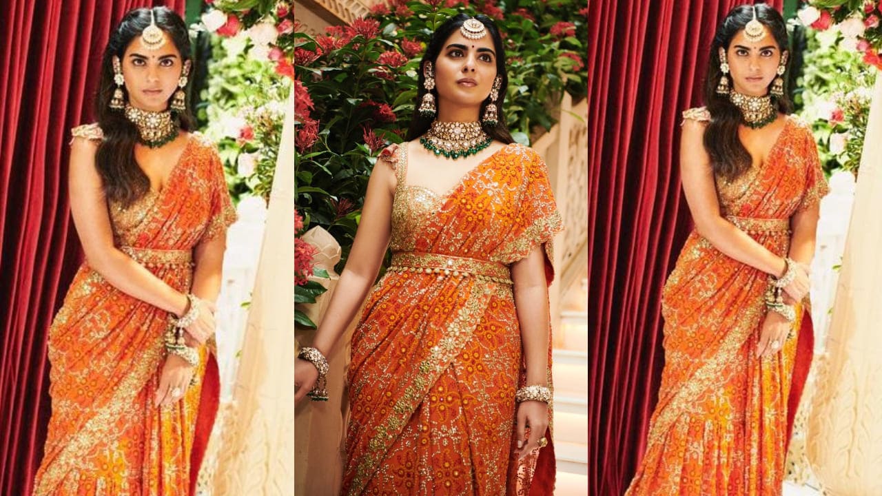 Isha Ambani in orange ruffled saree