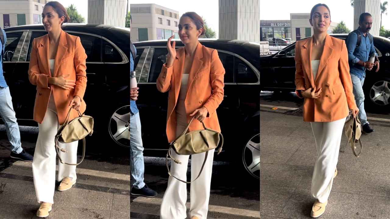 Kiara Advani flaunts her morning glow in off-duty airport look with orange blazer, white pants, and high-end Loewe bag (PC: Varinder Chawla)