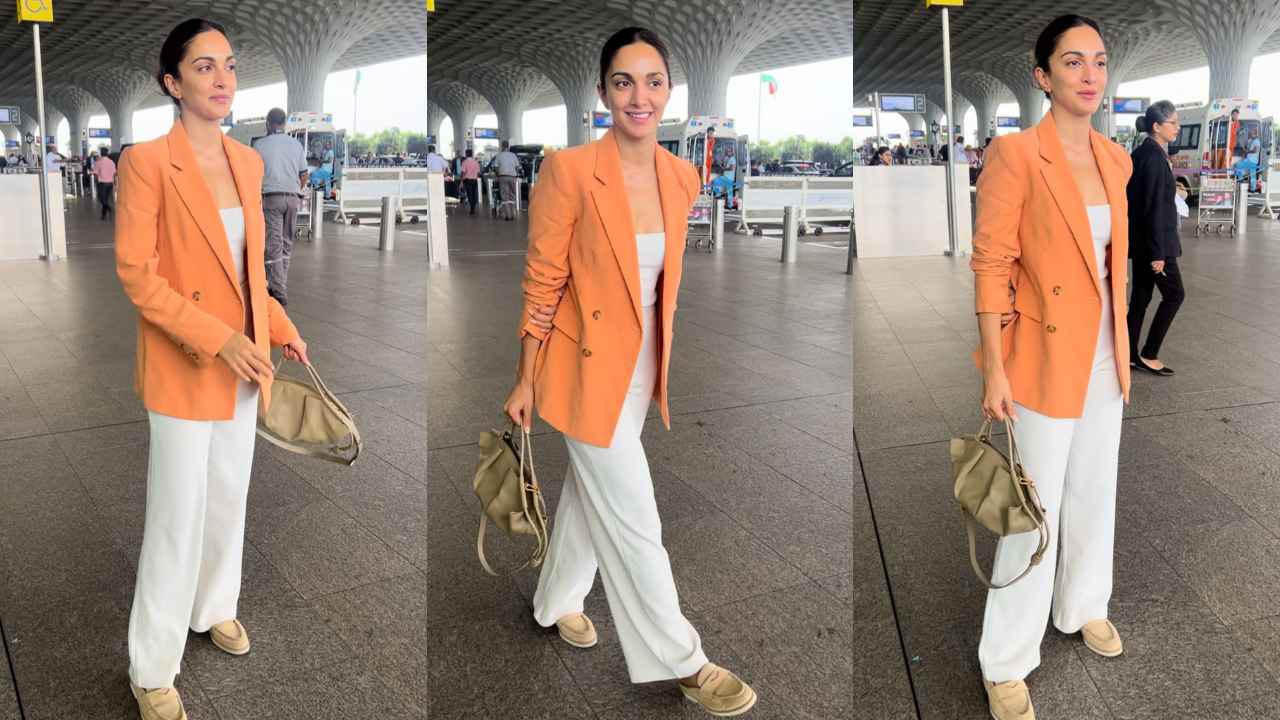 Kiara Advani flaunts her morning glow in off-duty airport look with orange blazer, white pants, and high-end Loewe bag (PC: Varinder Chawla)