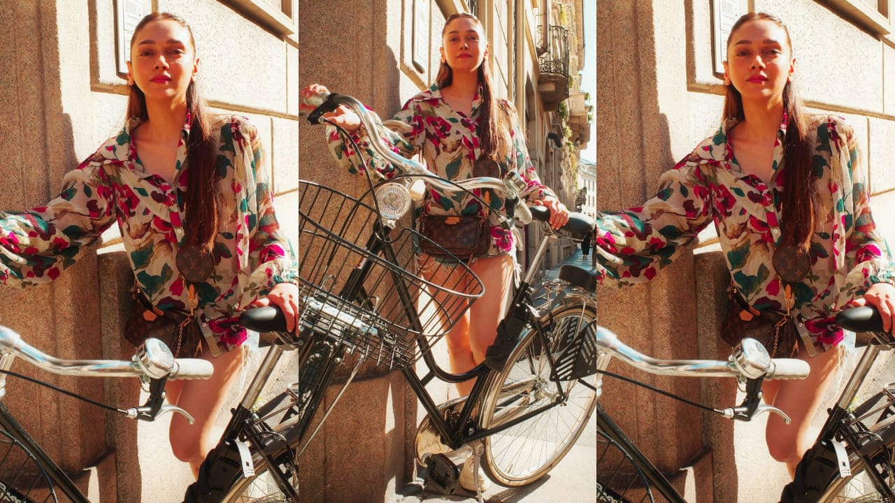 Aditi Rao Hydari in floral shirt and denim shorts