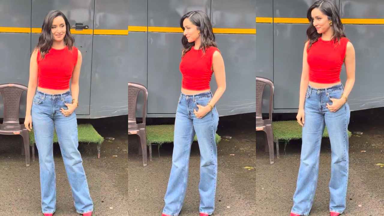 Shraddha Kapoor pairs sleeveless red crop top and wide-legged jeans with pumps for a radiant look (PC: Pinkvilla)