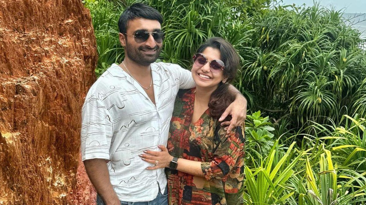 Meera Nandan poses with her husband