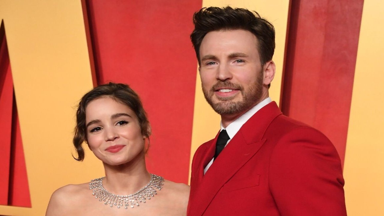 Chris Evans and Alba Baptista via Getty Images