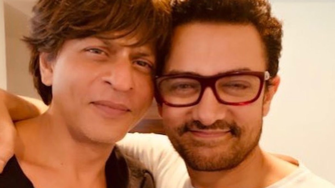 Shah Rukh Khan and Aamir Khan warmly greeting each other in UNSEEN pic from a senior photographer’s prayer meet goes viral