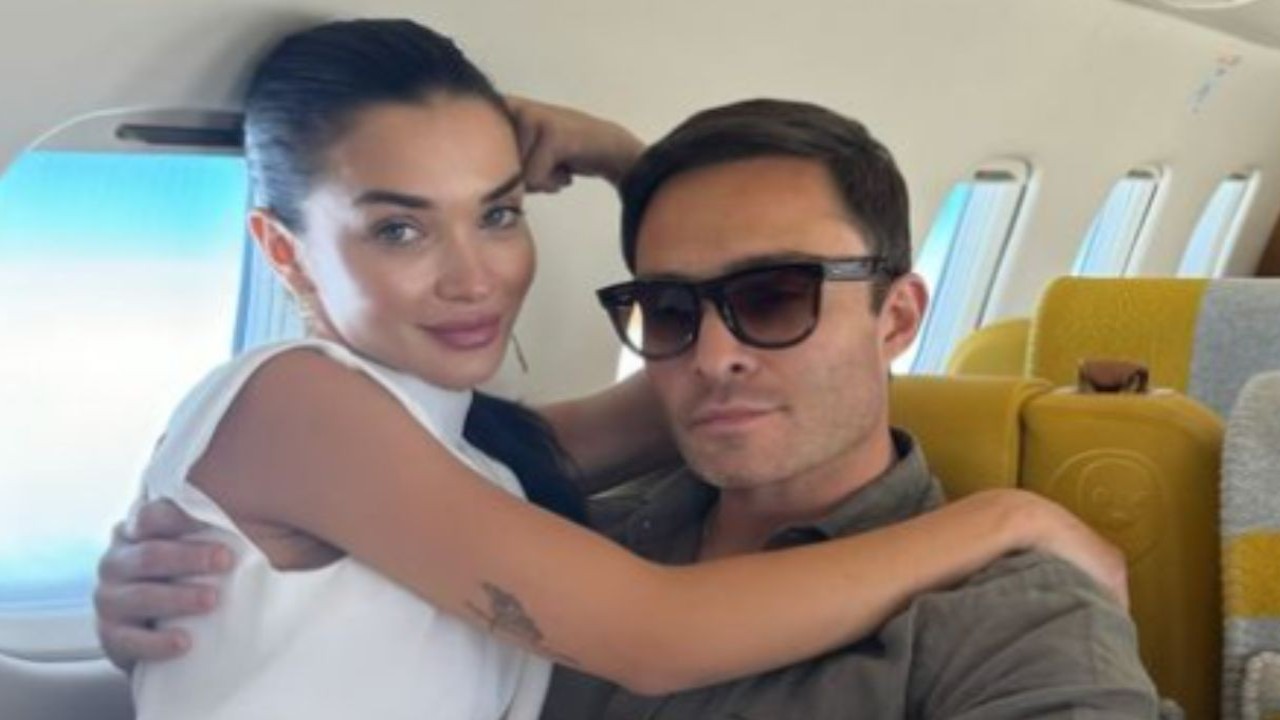 PICS: Bride-to-be Amy Jackson kisses Ed Westwick in private jet as they head to Italy with family for their wedding; don't miss her unique earrings