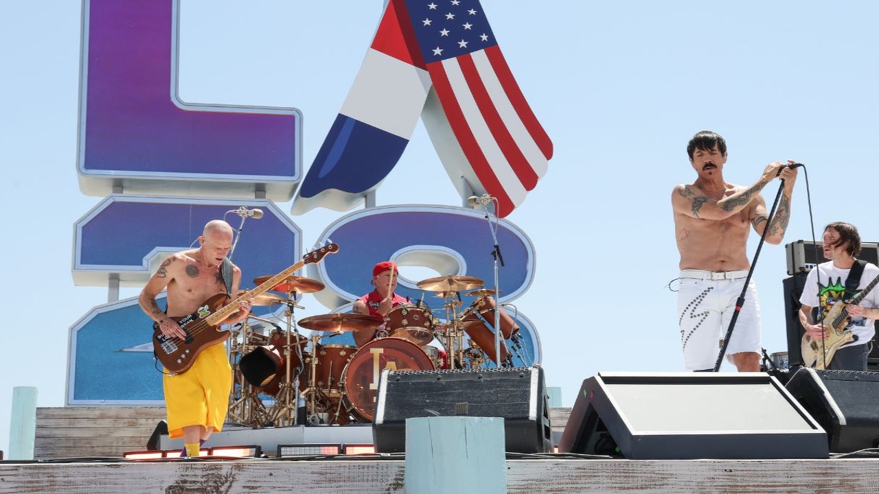 Red Hot Chili Peppers present a powerful rendition of their classic “Can’t Stop” at the closing ceremony of the 2024 Olympic Games in Paris; DEETS