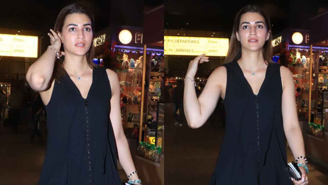 Kriti Sanon’s baggy black hooded zip dress is the perfect travel-ready choice for modern fashionistas (PC: Viral Bhayani, Varinder Chawla)