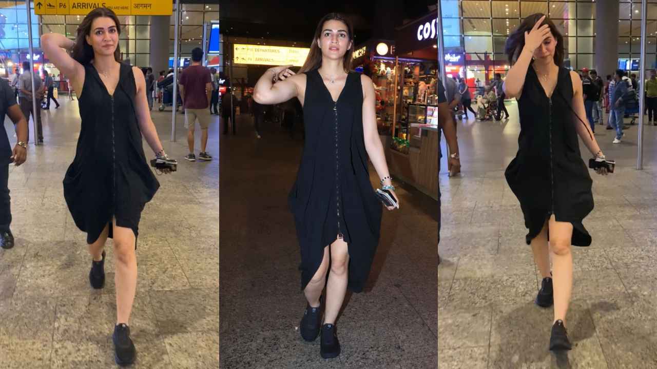 Kriti Sanon’s baggy black hooded zip dress is the perfect travel-ready choice for modern fashionistas (PC: Viral Bhayani, Varinder Chawla)