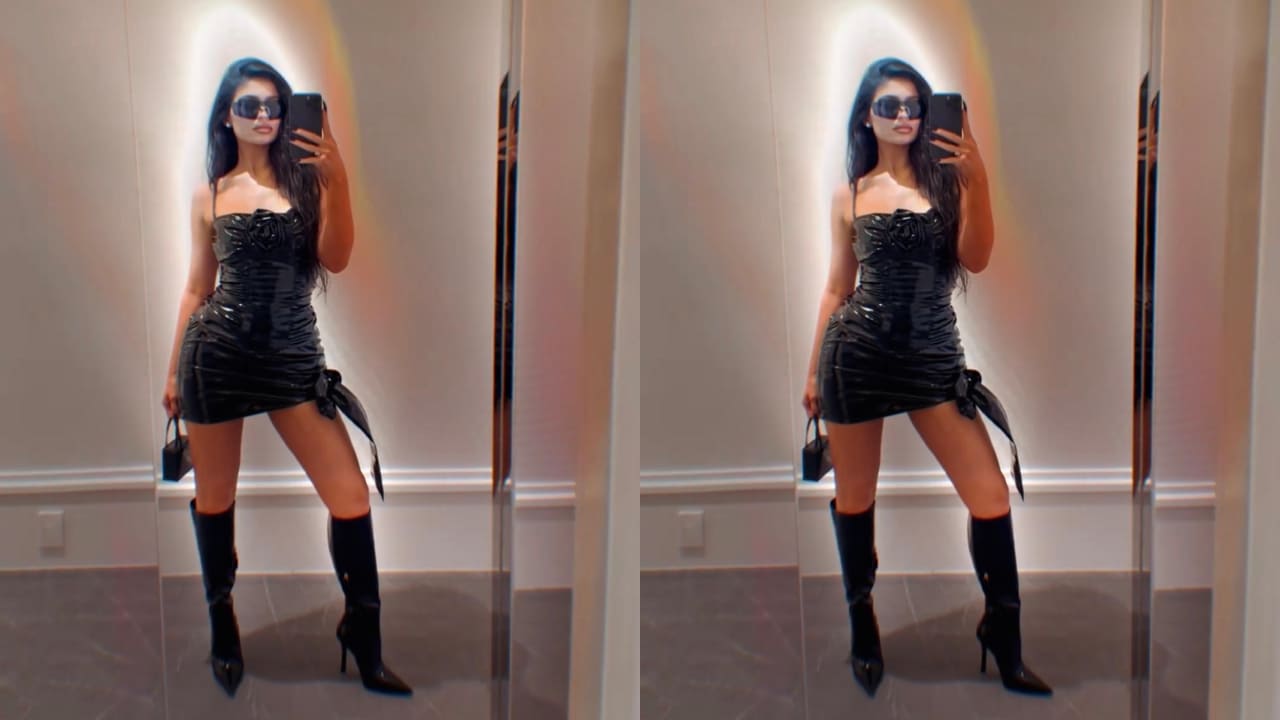 Kylie Jenner in black latex dress