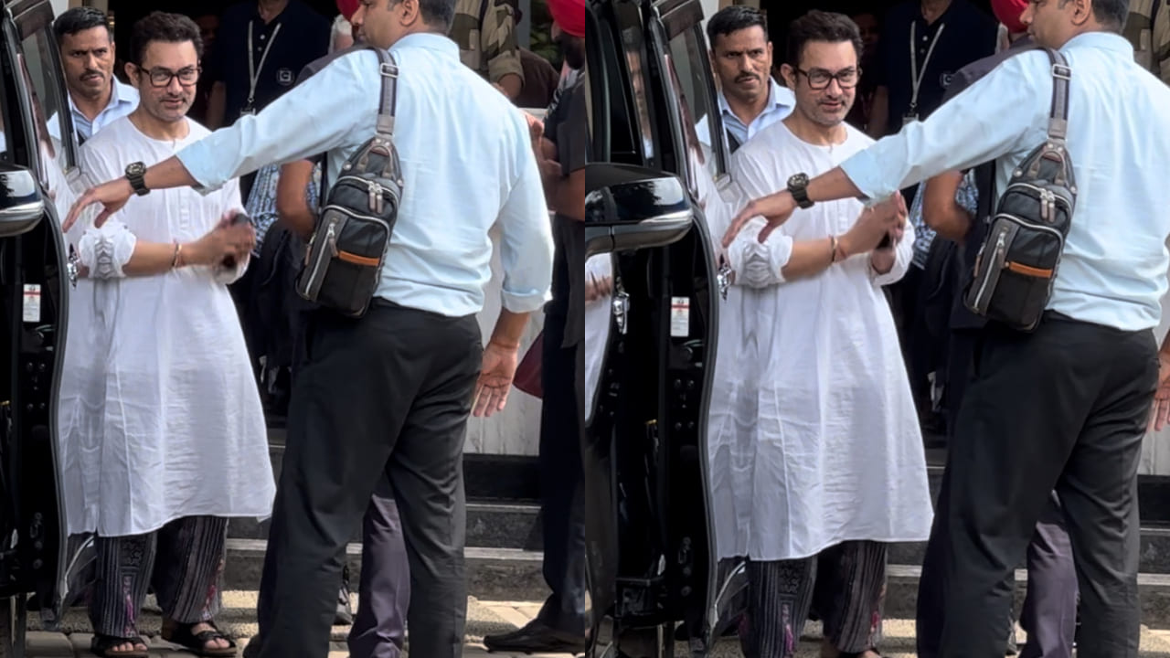 Aamir Khan with his white kurta and black trousers gives basics a mix-and-match spin