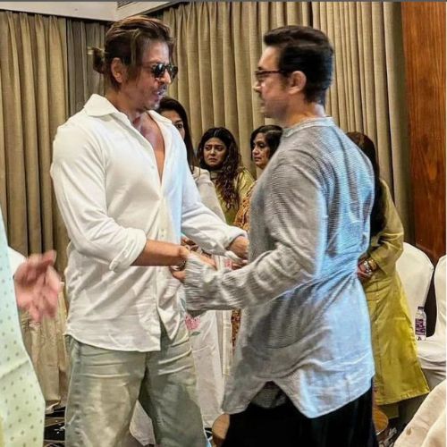 Shah Rukh Khan and Aamir Khan warmly greeting each other in UNSEEN pic from a senior photographer’s prayer meet goes viral