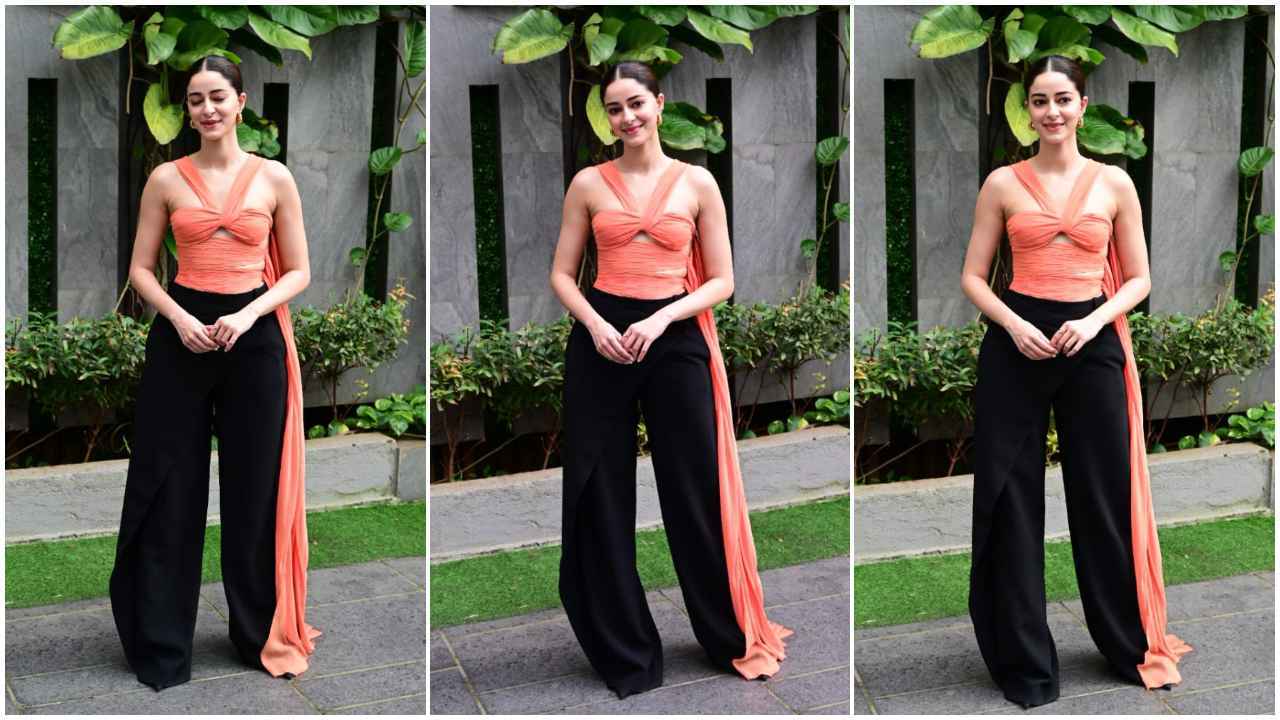 Ananya Panday ROCKS In Prabal Gurung’s orange top with black side-draped pants (PC: Viral Bhayani)