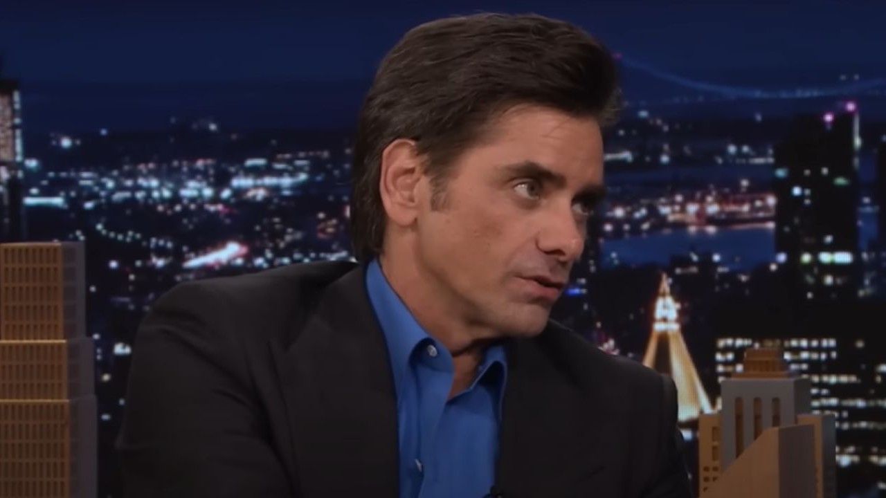 John Stamos Reveals He Was 'Kicked' Out of Scientology Orientation For THIS Hilarious R...