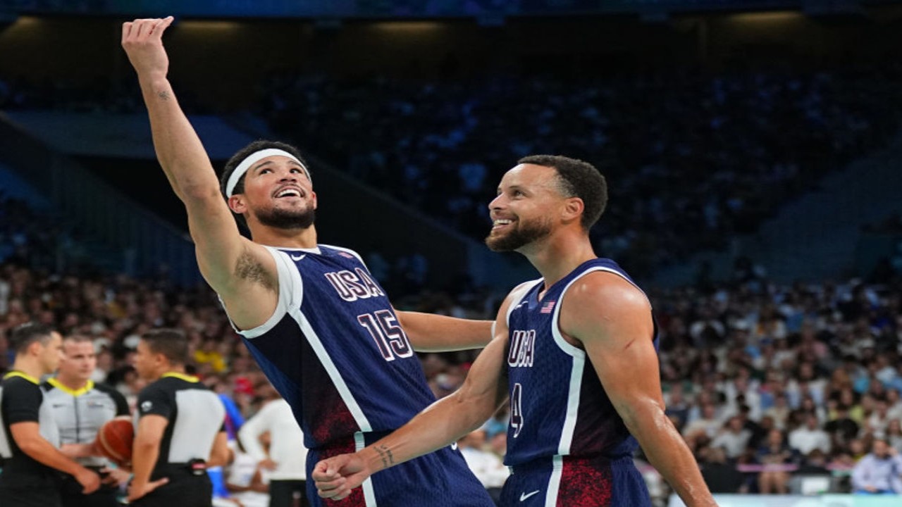 Devin Booker calls Steph Curry ‘the best shooter of all time’ after the Warriors star led the US team to the gold medal at the Olympics