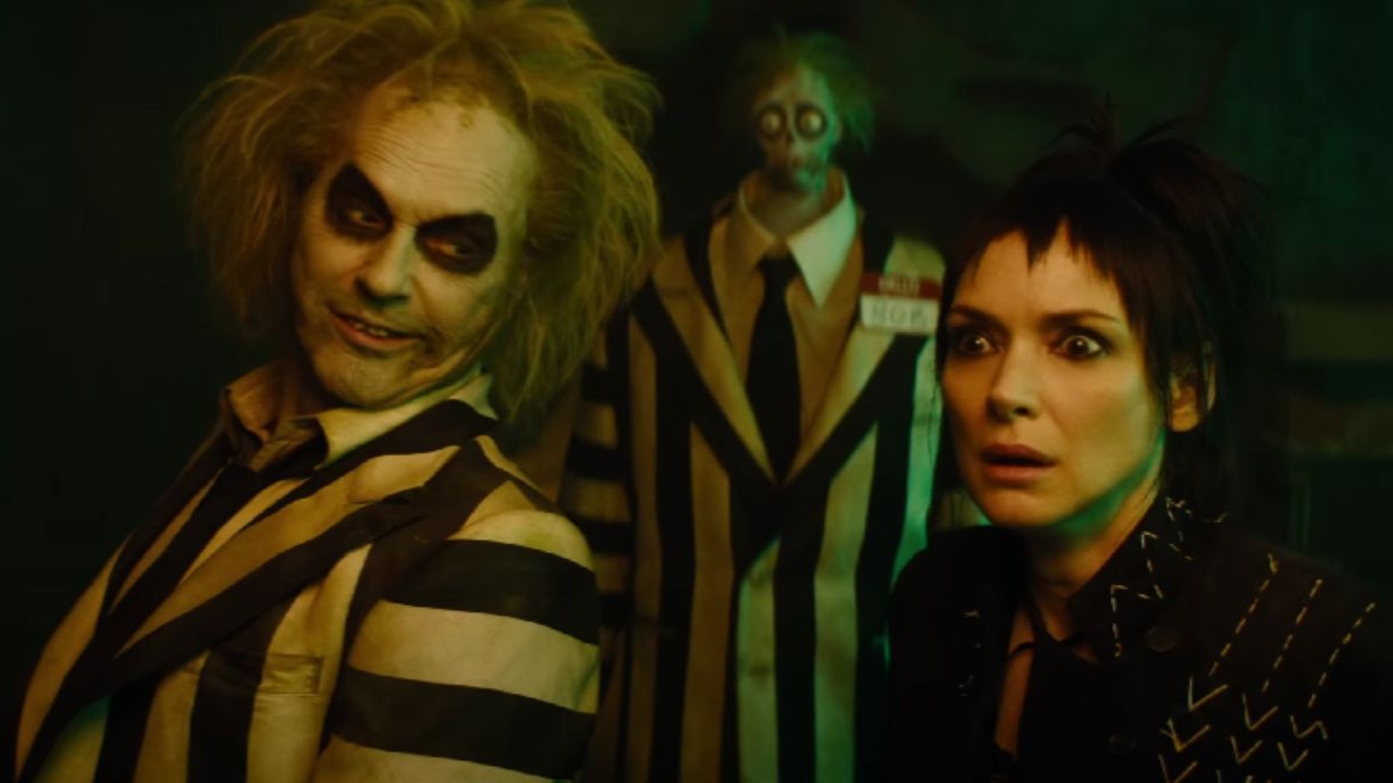 Michael Keaton and Winona Ryder (Image via YouTube/Warner Bros. Pictures)