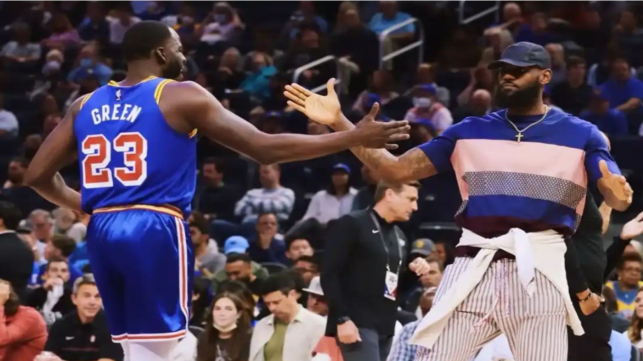 LeBron James celebrates with Draymond Green and enjoys his NBA break after winning Olympic gold