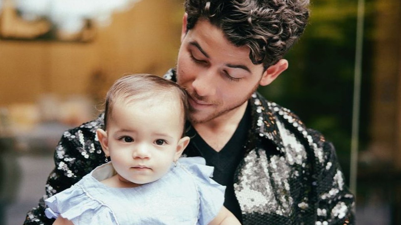 Nick Jonas and Malti Marie 