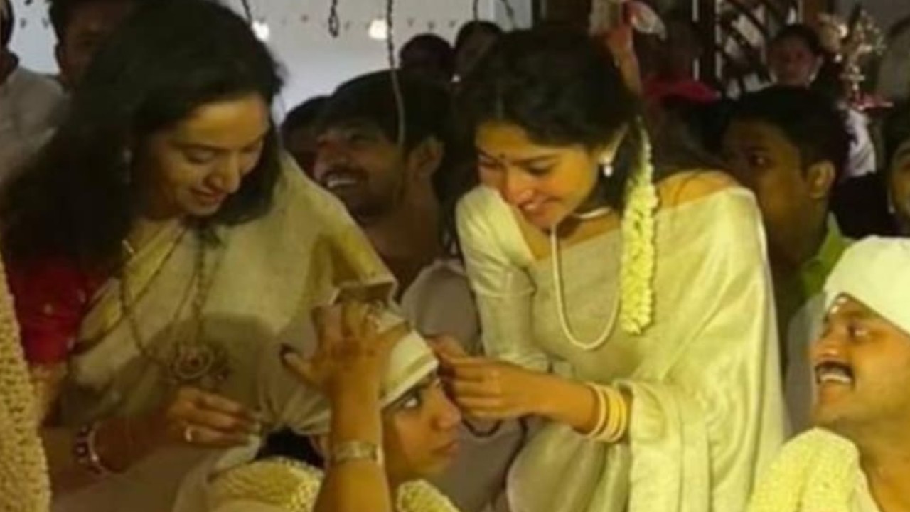 VIDEOS: Sai Pallavi performs rituals at sister Pooja Kannan's wedding; dances with family