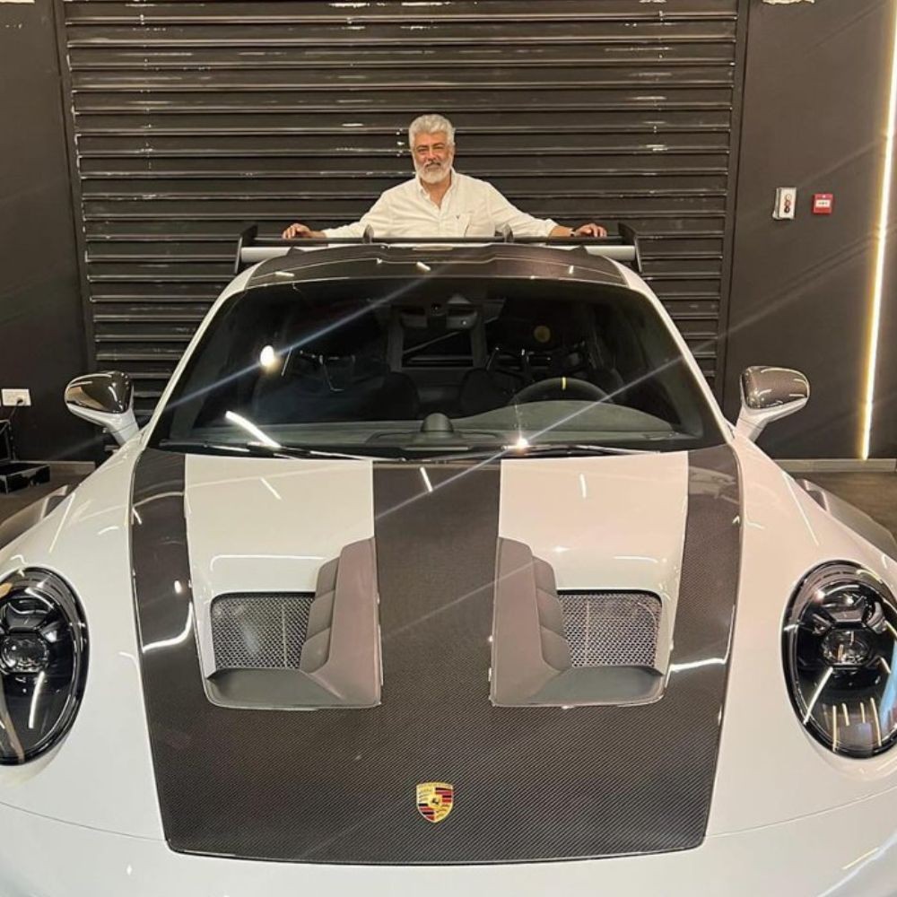 VIRAL PHOTOS: Ajith Kumar adds new Porsche GT3 RS car worth almost Rs 4 crore to his collection; clicked at Dubai showroom