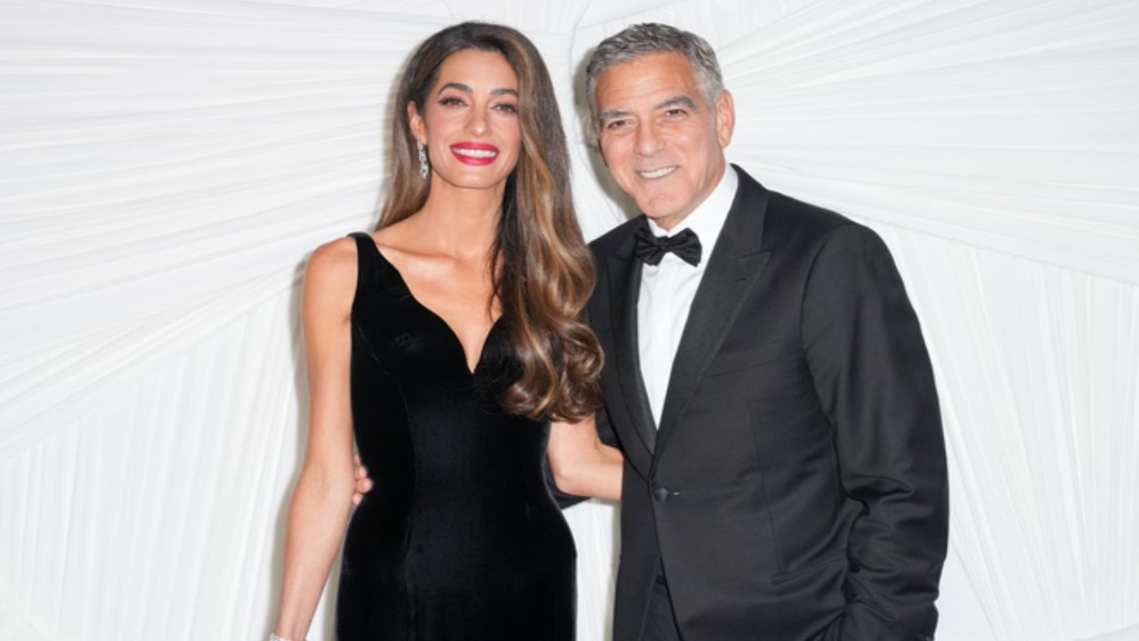 George Clooney and his wife Amal Clooney - Getty Images