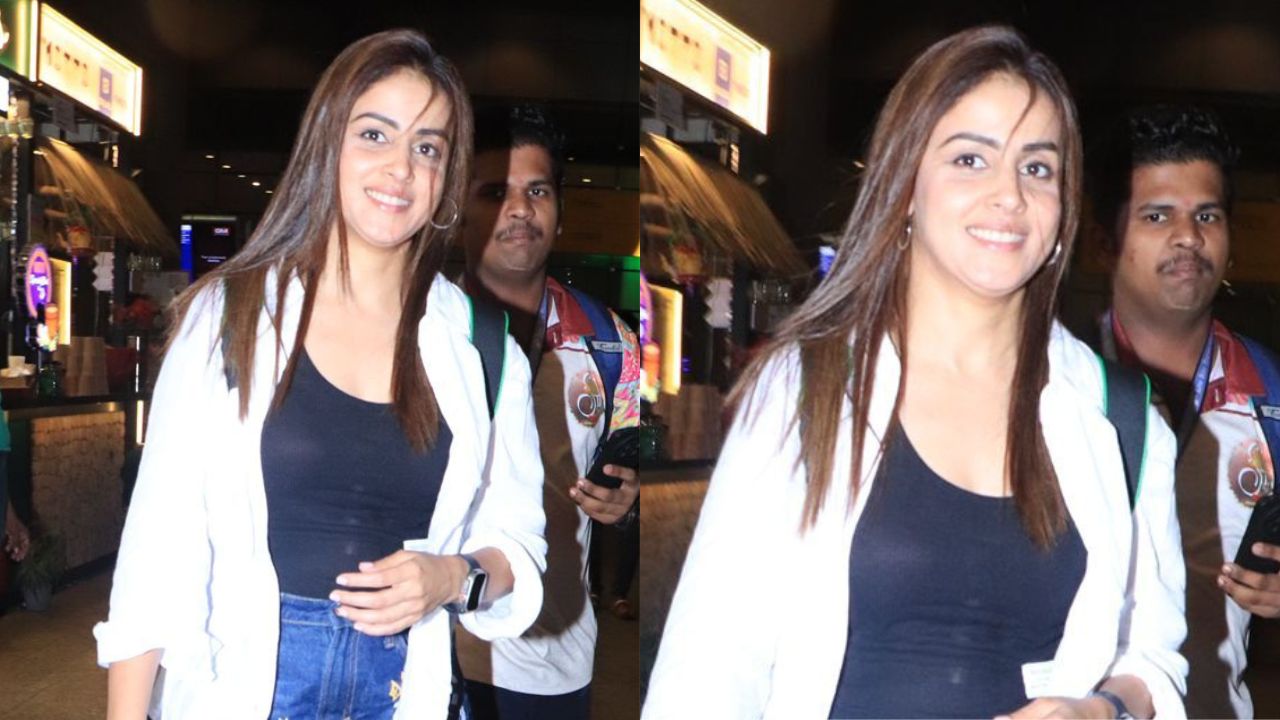 Genelia D'Souza wears quirky, colorful jeans at Mumbai airport (Credit: Viral Bhayani)