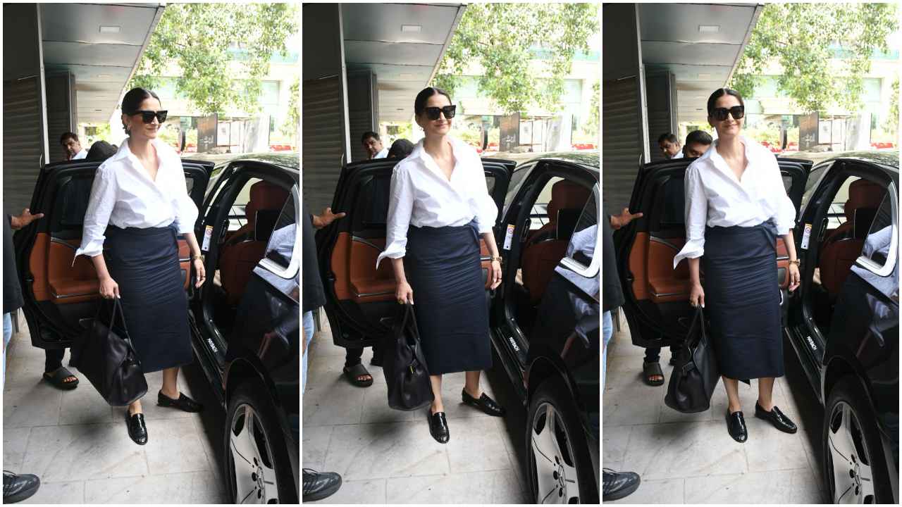 Sonam Kapoor’s white shirt and black wrap-up style skirt look is making us sing ‘Rabba Main Toh Mar Gaya’ (PC: Viral Bhayani)