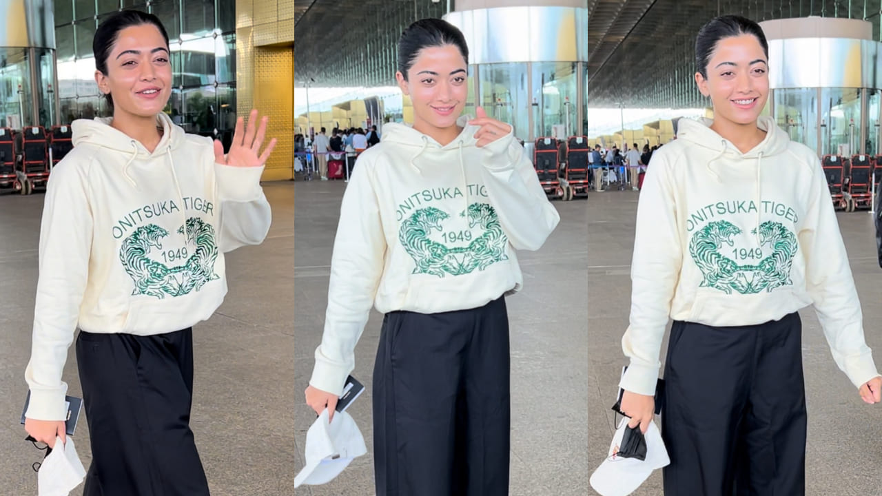 Rashmika Mandanna in hoodie and flared pants at airport