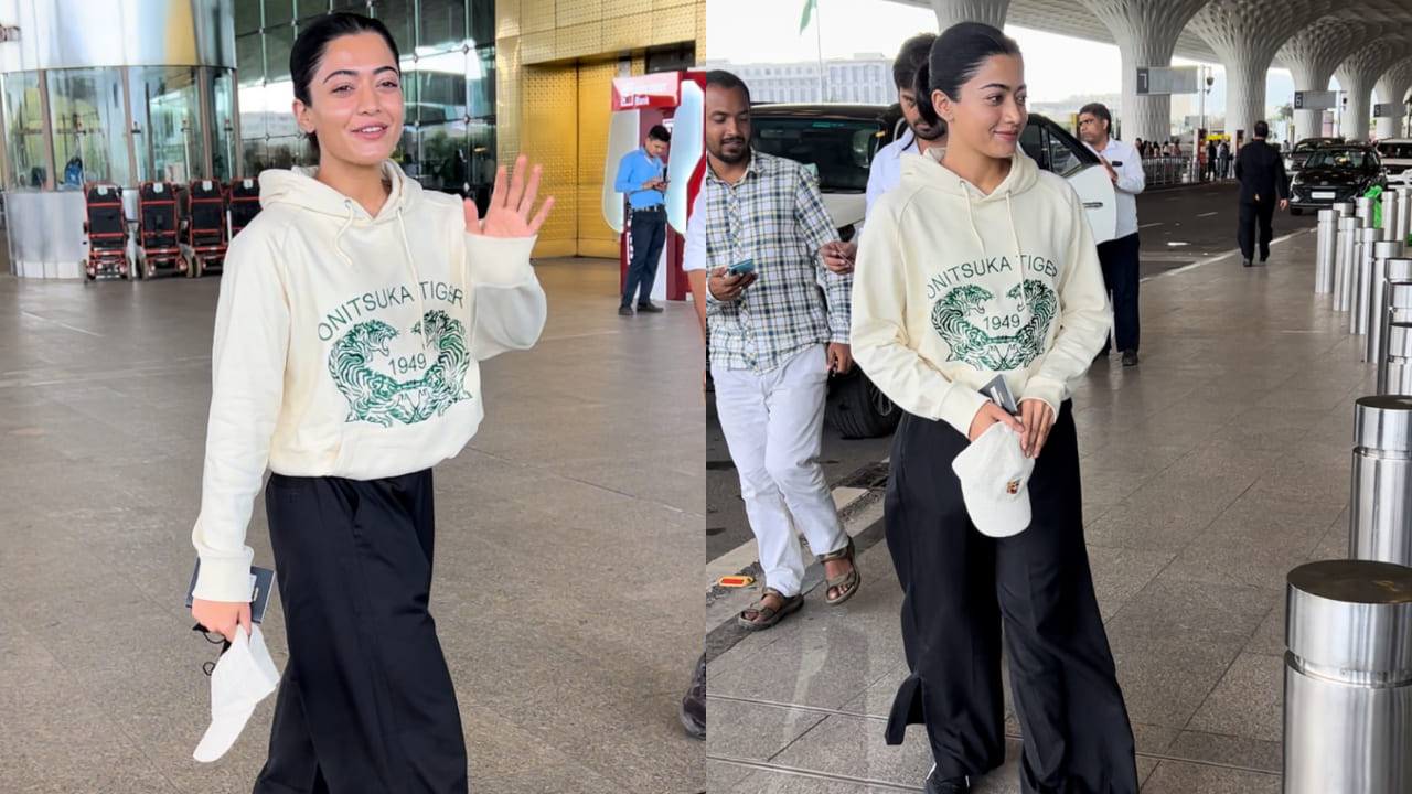 Rashmika Mandanna in hoodie and flared pants at airport