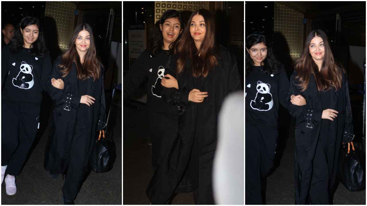 Aishwarya Rai Bachchan keeps her airport style game consistent with black trench coat and Gucci bag  (PC: Viral Bhayani)