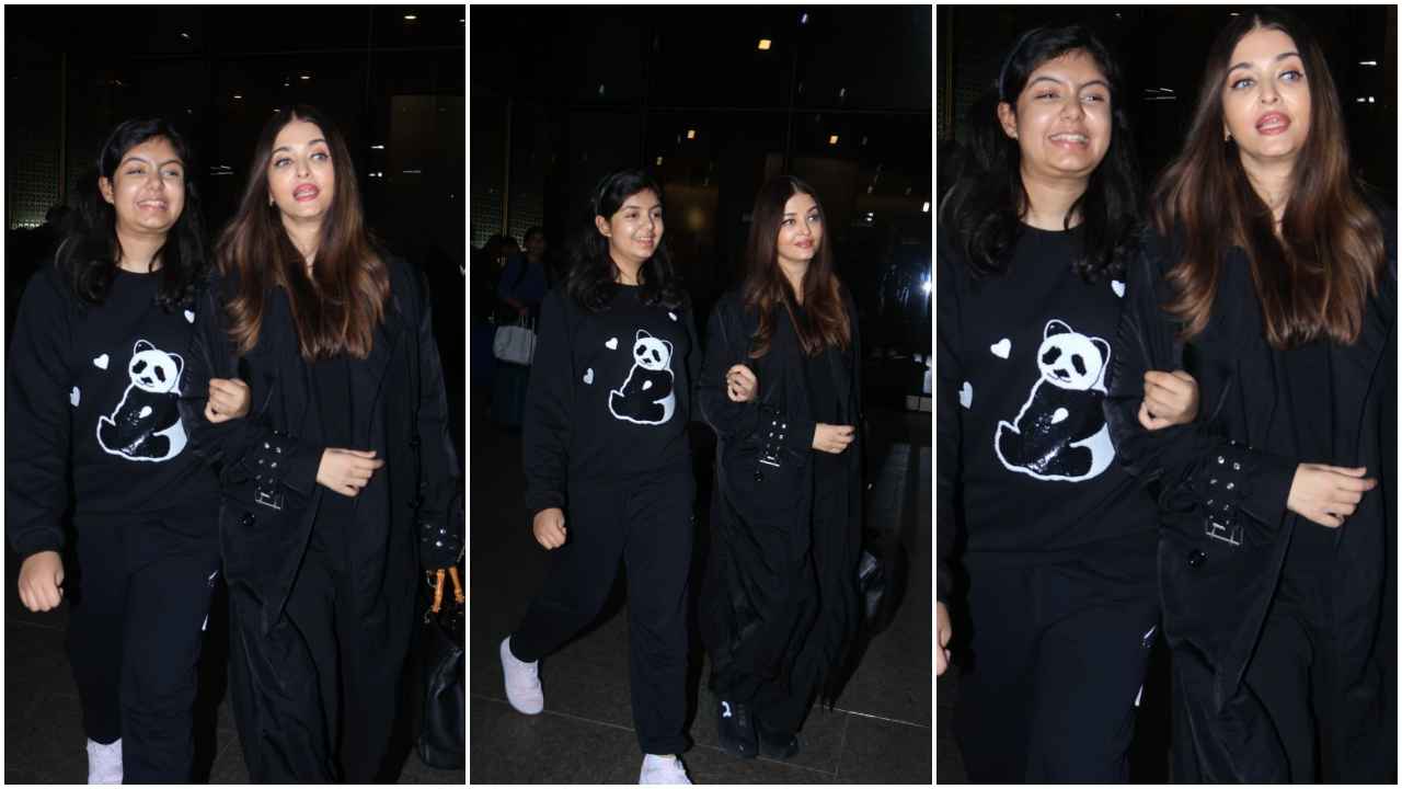 Aishwarya Rai Bachchan keeps her airport style game consistent with black trench coat and Gucci bag  (PC: Viral Bhayani)