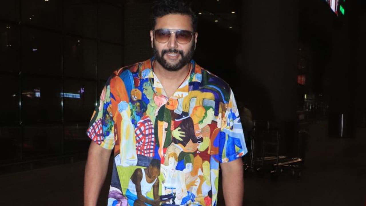 PHOTOS: Jayam Ravi turns heads at Mumbai airport with his unique and vibrant blue abstract art shirt