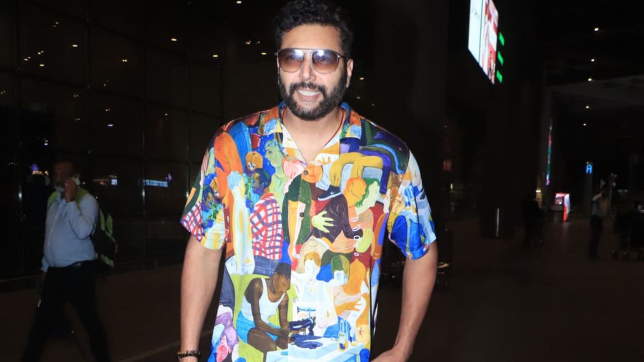 PHOTOS: Jayam Ravi turns heads at Mumbai airport with his unique and vibrant blue abstract art shirt